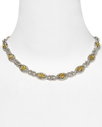 Nadri's striking canary-yellow necklace is designed to add a flourish to your evening ensembles, featuring dazzling crystals and stones. Nadri's striking canary-yellow necklace is designed to add a flourish to your evening ensembles, featuring dazzling crystals and stones.