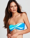 Introduce a high-color kick into your poolisde portfolio with this zig zag bikini from Carmen Marc Valvo. It's bold colorway and preppy pattern are sure to make waves.