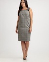 A sleek shift featuring a timeless plaid pattern and delicate lace details. This dress was designed to fit you flawlessly thanks to expert tailoring and a touch of stretch.Feminine necklineSleevelessPrincess seamsFrench dartsBack zipperBack ventFully linedAbout 26 from natural waist64% polyester/33% viscose/3% spandexDry cleanMade in Italy