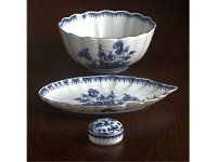 Edged in gold, this distinguished dinner service is based on a Chinese export porcelain pattern circa 1730 featuring a flowered medallion and floral sprays. Edged in gold, this distinguished dinner service is based on a Chinese export porcelain pattern circa 1730 featuring a flowered medallion and floral sprays.