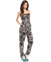 A boldly graphic print makes this RACHEL Rachel Roy jumpsuit a statement piece for a standout soiree look!