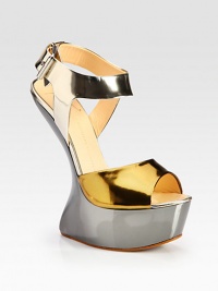 Metallic patent leather in contrasting tones with an architectural wedge, sturdy platform and adjustable ankle strap. Metal wedge, 6¼ (155mm)Covered platform, 1½ (40mm)Compares to a 4¾ heel (120mm)Metallic patent leather upperAdjustable ankle strapLeather lining and solePadded insoleMade in Italy Metallic patent leather in contrasting tones with an architectural wedge, sturdy platform and adjustable ankle strap. Metal wedge, 6¼ (155mm)Covered platform, 1½ (40mm)Compares to a 4¾ heel (120mm)Metallic patent leather upperAdjustable ankle strapLeather lining and solePadded insoleMade in Italy