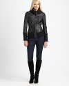 Intricate seams lend fashion-forward appeal to this supple leather jacket. Classic cable knit offers a touch of chic coziness. Fold-down collarCable-knit collar, cuffs and hemZipper closureSlash pocketsAbout 21 from shoulder to hemBody: lambskin leatherCable-knit details: 37% acrylic/26% wool/23% polyester/9% alpaca/5% polyamideDry clean by leather specialistImported Model shown is 5'10 (177cm) wearing US size Small. 