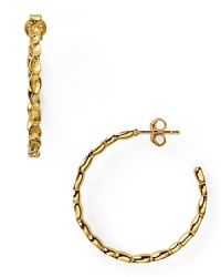 Play hoops with this ornate 14-karat gold pair from Melinda Maria, accented by cubic zirconia stones for added sparkle. Play hoops with this ornate 14-karat gold pair from Melinda Maria, accented by cubic zirconia stones for added sparkle.
