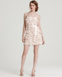 Allover petals lend dimension to this ultra-feminine Aidan Mattox dress, finished with a satiny ribbon belt. Allover petals lend dimension to this ultra-feminine Aidan Mattox dress, finished with a satiny ribbon belt.
