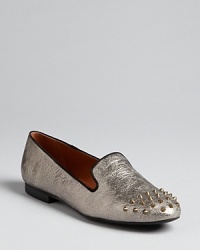 These SCHUTZ smoking flats add wow to a must-have silhouette with cracked metallic leather and spiked studs. These SCHUTZ smoking flats add wow to a must-have silhouette with cracked metallic leather and spiked studs.