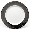 Romance dinner plate by Lauren Ralph Lauren Home. Inspired by tooled silver buckles, this striking collection offers classic forms with a surprising twist as the graceful lines dance on rich platinum and accents of turquoise are featured.