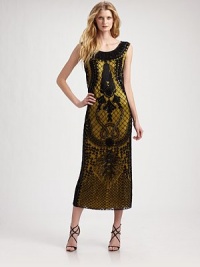 Delicate mesh with opulent beadwork on an elongated silhouette of bright hued Italian silk, make a truly elegant statement.Scoopneck Sleeveless Allover beaded tulle overlay Side zip closure About 38 from natural waist Bright silk lining Nylon; dry clean Made in Italy Delicate mesh with opulent beadwork on an elongated silhouette of bright hued Italian silk, make a truly elegant statement.Scoopneck Sleeveless Allover beaded tulle overlay Side zip closure About 38 from natural waist Bright silk lining Nylon; dry clean Made in Italy