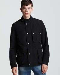 A buttoned-up look from the iconic Burberry Brit spruces up your attire with sleek designer flair and refinement. A buttoned-up look from the iconic Burberry Brit spruces up your attire with sleek designer flair and refinement.