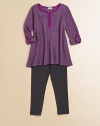 The perfect outfit for all her play dates, with a cute and comfy ribbed tunic and matching leggings. Shirt CrewneckButton frontThree-quarter sleeves with rolled tab cuffsA-line Leggings Pull-on style50% polyester/25% pima cotton/25% micromodalMachine washImported Please note: Number of buttons may vary depending on size ordered. 