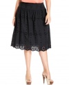 Add feminine flair to your style with Jones New York Signature's eyelet plus size skirt, defined by a flattering A-line shape.
