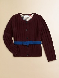 A wide ribbed texture and a contrast ribbon with a bow give this merino wool sweater its pretty panache.Round ribbed necklineLong sleeves with ribbed cuffsContrast attached self beltButton placketWide ribbed hemMerino woolDry cleanImported Please note: Number of buttons may vary depending on size ordered. A wide ribbed texture and a contrast ribbon with a bow give this merino wool sweater its pretty panache.Round ribbed necklineLong sleeves with ribbed cuffsContrast attached self beltButton placketWide ribbed hemMerino woolDry cleanImported Please note: Number of buttons may vary depending on size ordered.