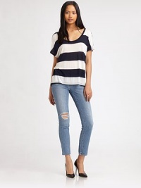 Skinny-fit stretch denim, lovingly distressed and styled in an ankle-baring crop.THE FITSkinny fitRise, about 8Inseam, about 30THE DETAILSZip flyFive-pocket style92% cotton/7% polyester/1% spandexDry cleanMade in USAModel shown is 5'11 (180cm) wearing US size 4.
