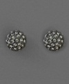 Earrings that go with everything. These sparkling studs by Givenchy feature black crystal accents set in hematite-plated mixed metal.