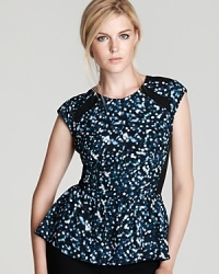 All that glitters is gorgeous! This party-ready Rebecca Taylor top features an allover glitter print and the latest peplum silhouette. All that glitters is gorgeous! This party-ready Rebecca Taylor top features an allover glitter print and the latest peplum silhouette.