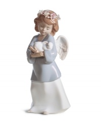 Utterly irresistible, the Heavenly Love figurine combines a sweet cherub and baby bunny in delicately glazed Lladro porcelain. Utterly irresistible, the Heavenly Love figurine combines a sweet cherub and baby bunny in delicately glazed Lladro porcelain.