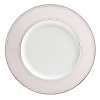 World-renowned fashion designer Monique Lhuillier collaborated with Waterford to create this fine china plate in beautiful blush tones adapted from her brilliant couture bridal gowns and red carpet creations.