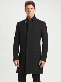 A classic overcoat is tailored with modern proportions from fine Italian wool, highlighting a sleek, streamlined silhouette and a removable nylon vest for long-lasting style, warmth and versatility.Button-frontStand collarChest welt, waist flap pocketsRear ventFully linedAbout 39 from shoulder to hemWoolDry cleanImported A classic overcoat is tailored with modern proportions from fine Italian wool, highlighting a sleek, streamlined silhouette and a removable nylon vest for long-lasting style, warmth and versatility.Button-frontStand collarChest welt, waist flap pocketsRear ventFully linedAbout 39 from shoulder to hemWoolDry cleanImported