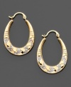 Lovely loops of sparkling 14k white & yellow gold: these earrings are a beautiful fashion statement. Approximate length: 1 inch. Approximate drop: 3/4 inches.