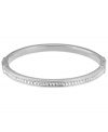 Style meant for stacking. This must-have design by Michael Kors combines a thin, stackable bangle with pave-set glass accents. Set in silver tone mixed metal. Approximate diameter: 2-1/2 inches.
