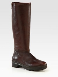 A seasonal favorite rendered in buttery leather, with a back zip closure and rubber trek sole. Rubber heel, 1¼ (30mm)Rubber platform, 1 (25mm)Compares to a ¼ heel (5mm)Shaft, 14½Leg circumference, 14Leather upperBack zip and snap closure at top of shaftLeather liningRubber trek solePadded insoleImported A seasonal favorite rendered in buttery leather, with a back zip closure and rubber trek sole. Rubber heel, 1¼ (30mm)Rubber platform, 1 (25mm)Compares to a ¼ heel (5mm)Shaft, 14½Leg circumference, 14Leather upperBack zip and snap closure at top of shaftLeather liningRubber trek solePadded insoleImported