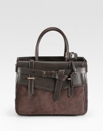 An elegant and sturdy style in smooth leather and soft suede, perfect for your essentials.Double top handles, 6 dropOpen topOne outside open pocketOne outside flap pocketTwo inside zip pocketsTwo inside open pocketsDetachable luggage tagCotton lining12¾W X 10H X 4DImported