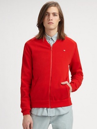 Bold and bright, with a sporty, athletic feel, shaped in a breathable blend of cotton and nylon for maximum comfort.Zip frontChest logo accentSide slash pocketsRibbed knit collar, cuffs and hem53% nylon/47% cottonDry cleanImported Bold and bright, with a sporty, athletic feel, shaped in a breathable blend of cotton and nylon for maximum comfort.Zip frontChest logo accentSide slash pocketsRibbed knit collar, cuffs and hem53% nylon/47% cottonDry cleanImported