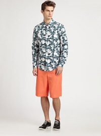 A pure vision of summer in breezy cotton with a photo-real iris print blooming allover. ButtonfrontChest patch pocketCottonDry cleanMade in USA A pure vision of summer in breezy cotton with a photo-real iris print blooming allover. ButtonfrontChest patch pocketCottonDry cleanMade in USA