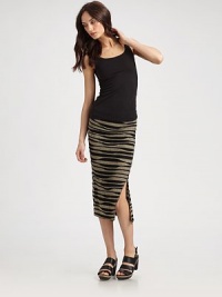 Fabulous and fitted, this lengthy essential has an abstract stripe print and alluring side slit. Elastic waistbandSide slitAbout 30 longViscoseDry cleanMade in USA of imported fabricModel shown is 5'10 (177cm) wearing US size Small. Fabulous and fitted, this lengthy essential has an abstract stripe print and alluring side slit. Elastic waistbandSide slitAbout 30 longViscoseDry cleanMade in USA of imported fabricModel shown is 5'10 (177cm) wearing US size Small.