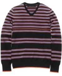 Stripe it rich in your seasonal wardrobe with this bold sweater from Sean John. Stripe it rich in your seasonal wardrobe with this bold sweater from Sean John.