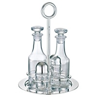 Vertigo table accessories are modern pieces for your table designed with a combination of silver holloware and crystal bases. Vertigo table accessories are a perfect compliment to other Vertigo pieces including: coffee service; barware; trays; open vegetable dish; and 3-part hors d'oeuvre server. Shown here is the Vertigo butter dish. Also available is a gravy boat; 4 part condiment set with tray; set of 4 knife rests ; salt & pepper; and jam jar. Vertigo table accessories are modern pieces for your table designed with a combination of silver holloware and crystal bases. Vertigo table accessories are a perfect compliment to other Vertigo pieces including: coffee service; barware; trays; open vegetable dish; and 3-part hors d'oeuvre server. Shown here is the Vertigo butter dish. Also available is a gravy boat; 4 part condiment set with tray; set of 4 knife rests ; salt & pepper; and jam jar.