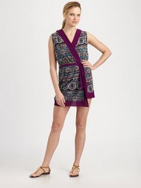 A gorgeous tribal print decorates this wraparound design with a convenient hood.Attached hoodSelf-tie beltSolid trimPolyamideDry cleanMade in Italy A gorgeous tribal print decorates this wraparound design with a convenient hood.Attached hoodSelf-tie beltSolid trimPolyamideDry cleanMade in Italy