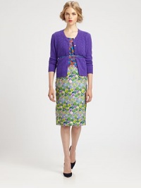 Soft and colorful, knit in a prettily open-weave lace pattern.Rib-knit crewneck, cuffs and hemButton frontThree-quarter sleevesViscose/cottonDry cleanImportedModel shown is 5'10 (177cm) wearing US size Small. Soft and colorful, knit in a prettily open-weave lace pattern.Rib-knit crewneck, cuffs and hemButton frontThree-quarter sleevesViscose/cottonDry cleanImportedModel shown is 5'10 (177cm) wearing US size Small.
