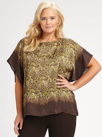 An eye-catching satin design featuring a classic paisley print and ultra-feminine flutter sleeves. It provides an exquisite sartorial contrast to a fitted skirt or pants.BoatneckFlutter sleevesDip-dye hemPull-on styleAllover printAbout 27 from shoulder to hemPolyesterMachine washImported An eye-catching satin design featuring a classic paisley print and ultra-feminine flutter sleeves. It provides an exquisite sartorial contrast to a fitted skirt or pants.BoatneckFlutter sleevesDip-dye hemPull-on styleAllover printAbout 27 from shoulder to hemPolyesterMachine washImported