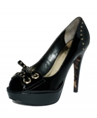 The kind of shoes your mother warned you about. The Kadi platform pumps take bold to the next level with shining patent leather accented by metal grommets. The kind of shoes your mother warned you about. The Kadi platform pumps take bold to the next level with shining patent leather accented by metal grommets.