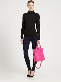 Ultra-soft Merino wool is crafted in a classic turtleneck silhouette and given a glamorous update with flattering princess seams and ruched sleeves.TurtleneckLong shirred sleevesPullover styleRibbed cuffs and hemPrincess seamsAbout 26 from shoulder to hemMerino woolDry cleanImported Model shown is 5'10 (176cm) wearing US size Small. Ultra-soft Merino wool is crafted in a classic turtleneck silhouette and given a glamorous update with flattering princess seams and ruched sleeves.TurtleneckLong shirred sleevesPullover styleRibbed cuffs and hemPrincess seamsAbout 26 from shoulder to hemMerino woolDry cleanImported Model shown is 5'10 (176cm) wearing US size Small.