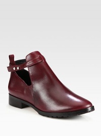 The ultimate downtown silhouette, impeccably tailored of supple leather and topped with shiny metal buttons. Stacked heel, 1¼ (30mm)Leather upperAnkle strap with metal button closuresLeather liningRubber solePadded insoleImported The ultimate downtown silhouette, impeccably tailored of supple leather and topped with shiny metal buttons. Stacked heel, 1¼ (30mm)Leather upperAnkle strap with metal button closuresLeather liningRubber solePadded insoleImported