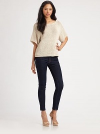 Soft cotton knit in a slightly oversized pullover styled with a cropped hem.BoatneckDropped shouldersShort dolman sleevesPullover styleAbout 24 from shoulder to hemCottonDry cleanImportedModel shown is 5'10 (177cm) wearing US size Small. Soft cotton knit in a slightly oversized pullover styled with a cropped hem.BoatneckDropped shouldersShort dolman sleevesPullover styleAbout 24 from shoulder to hemCottonDry cleanImportedModel shown is 5'10 (177cm) wearing US size Small.