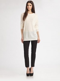Extra-fine merino wool knit in a soft, slouchy, tunic-length pullover.RoundneckDropped shouldersRibbed trimPullover styleAbout 29 from shoulder to hemWoolDry cleanImportedModel shown is 5'9½ (176cm) wearing US size Small. Extra-fine merino wool knit in a soft, slouchy, tunic-length pullover.RoundneckDropped shouldersRibbed trimPullover styleAbout 29 from shoulder to hemWoolDry cleanImportedModel shown is 5'9½ (176cm) wearing US size Small.