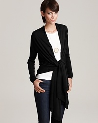 Undone, tied or wrapped, DKNY's essential cozy layers seamlessly over your favorite looks for versatile style.