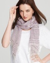 A layering essential, this lightweight Eileen Fisher scarf is the perfect finishing touch for easy summer style.