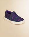 An adorable slip-on sneaker is rendered in durable preppy plaid canvas.Slip-on with elastic goreCanvas upperCotton canvas liningRubber solePadded insoleImported