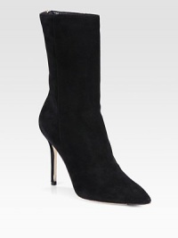 This short silhouette is a new take on classic suede boots with a timeless point toe. Self-covered heel, 4 (100mm)Shaft, 8½Leg circumference, 5½Suede upperPoint toeBack zipLeather lining and solePadded insoleMade in Italy This short silhouette is a new take on classic suede boots with a timeless point toe. Self-covered heel, 4 (100mm)Shaft, 8½Leg circumference, 5½Suede upperPoint toeBack zipLeather lining and solePadded insoleMade in Italy