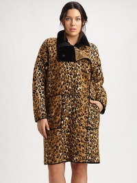A brilliant Italian design featuring a bold leopard print. Its relaxed fit will flawlessly complement virtually any of your outfits. Concealed front zipperDropped shouldersPatch pocketsAllover printSolid trimAbout 38 from shoulder to hemSilkDry cleanMade in Italy A brilliant Italian design featuring a bold leopard print. Its relaxed fit will flawlessly complement virtually any of your outfits. Concealed front zipperDropped shouldersPatch pocketsAllover printSolid trimAbout 38 from shoulder to hemSilkDry cleanMade in Italy