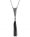 Ornate elegance. This Y-shaped necklace from GUESS is crafted from hematite-tone mixed metal with a glass crystal tassel and a filigree pattern for a refined touch. Approximate length: 18 inches + 2-inch extender. Approximate drop: 6-1/2 inches. Approximate diameter: 1/2 inch.