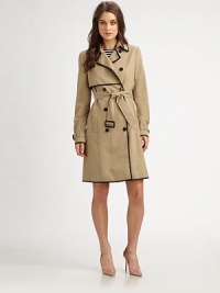 Timeless and versatile, this double-breasted trench boasts the impeccable tailoring and attention to fit that Theory is known for.Notch collar with hook-and-eye closureGun-flapButton frontSelf-beltSlash pocketsBack ventAbout 22 from shoulder to hemCottonMachine washImportedModel shown is 5'10 (177cm) wearing US size Small. Timeless and versatile, this double-breasted trench boasts the impeccable tailoring and attention to fit that Theory is known for.Notch collar with hook-and-eye closureGun-flapButton frontSelf-beltSlash pocketsBack ventAbout 22 from shoulder to hemCottonMachine washImportedModel shown is 5'10 (177cm) wearing US size Small.