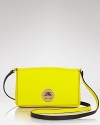 Day, night, and all around town: kate spade new york hits the bright spot with this shapely leather crossbody, detailed with a turnlock closure.