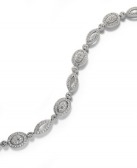 Seamless sparkle adds the perfect last-minute touch. Eliot Danori's stunning all-around crystal Windsor bracelet is set in rhodium-plated mixed metal for shine that lasts a lifetime. Approximate length: 7-1/4 inches. Seamless sparkle adds the perfect last-minute touch. Eliot Danori's stunning all-around crystal Windsor bracelet is set in rhodium-plated mixed metal for shine that lasts a lifetime. Approximate length: 7-1/4 inches.