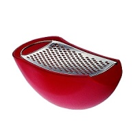 Parmenide is a cheese grater and cellar, part of the collection named Memory Containers. The grater fits perfectly into the cellar rim while the cellar's flat bottom creates stability on any surface and collects the cheese without spilling. Parmenide is a cheese grater and cellar, part of the collection named Memory Containers. The grater fits perfectly into the cellar rim while the cellar's flat bottom creates stability on any surface and collects the cheese without spilling.