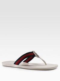 Leather flats with signature blue/red/blue web and interlocking GG detail. Cotton web Rubber sole Made in Italy Please note: Black sandal does not have signature web pattern. OUR FIT MODEL RECOMMENDS ordering one half size down as this style runs large. Leather flats with signature blue/red/blue web and interlocking GG detail. Cotton web Rubber sole Made in Italy Please note: Black sandal does not have signature web pattern. OUR FIT MODEL RECOMMENDS ordering one half size down as this style runs large.